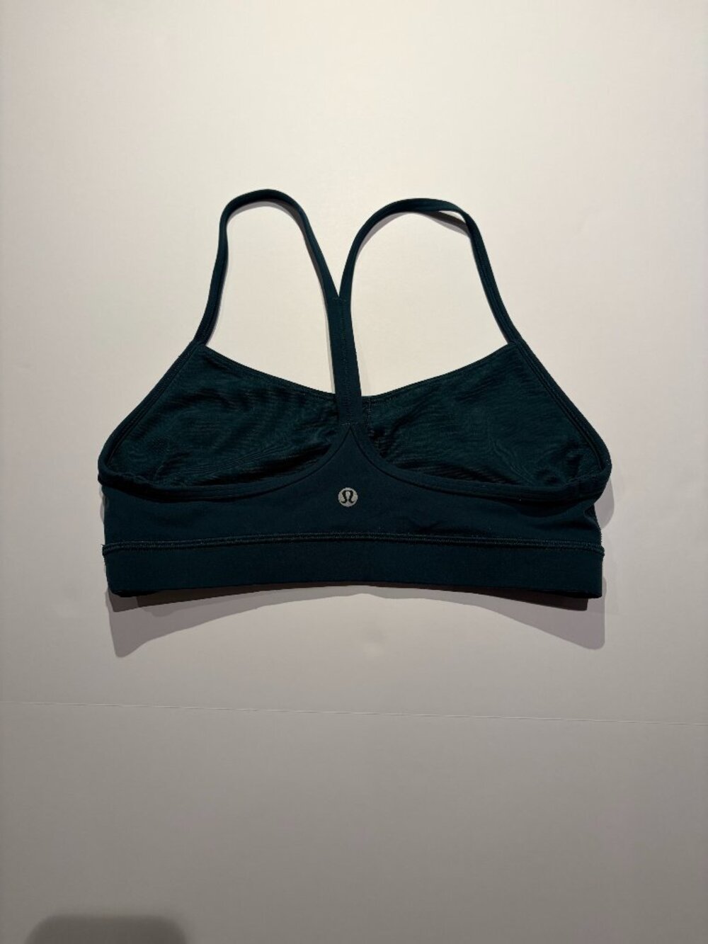 Lululemon Flow Y sports bra in a deep dark teal size 8